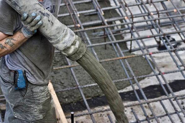 Screed being poured on a building site