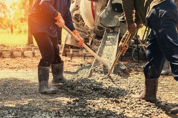 screen being poured on a building site 